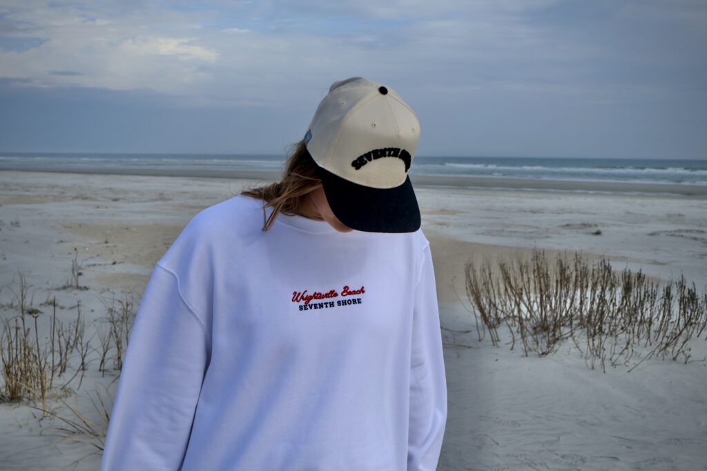Seventh Shore Riptide Hat worn on a beach walk at golden hour