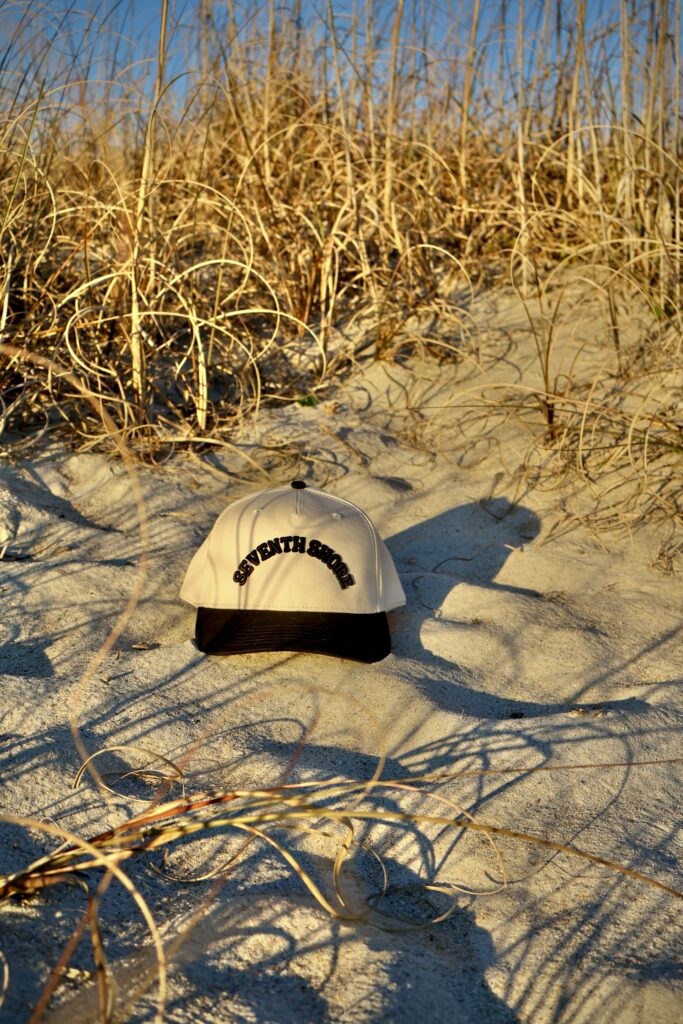 Seventh Shore Riptide Hat in natural light showing puffed Seventh Shore embroidery and 5-panel crown